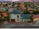 Charming two-story home with lush landscaping, large windows, a private dock and beautiful water views at 139 Wall St, Redington Shores, FL 33708