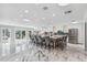 Expansive kitchen with a large island, seating for ten, stainless appliances, and plenty of natural light at 139 Wall St, Redington Shores, FL 33708