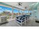 Spacious patio with comfortable outdoor seating and water views at 139 Wall St, Redington Shores, FL 33708