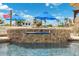 Close up on the pool featuring a hot tub with water flowing into the pool at 139 Wall St, Redington Shores, FL 33708