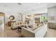 An open living space showcases an open floorplan, neutral tones, and seamlessly integrates the kitchen at 14705 Canopy Dr, Tampa, FL 33626