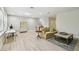Bright living room area showcasing wood floors and recessed lighting at 14705 Canopy Dr, Tampa, FL 33626