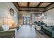 Inviting lobby area with comfortable seating, wood floors and stylish decor at 14705 Canopy Dr, Tampa, FL 33626