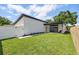 A fenced-in yard offers room for recreation and outdoor relaxation at 1514 55Th N Ave, St Petersburg, FL 33703