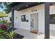 Charming home entrance featuring modern design elements and landscaping at 1514 55Th N Ave, St Petersburg, FL 33703
