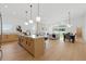Open-concept kitchen featuring a large island, modern appliances, and seamless flow to the dining and living areas at 1514 55Th N Ave, St Petersburg, FL 33703