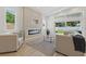 Living room with fireplace and sliding doors to the backyard at 1514 55Th N Ave, St Petersburg, FL 33703