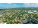 Real estate aerial view showcasing the neighborhood and its proximity to the ocean at 1758 Southview Rd, Largo, FL 33770