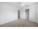 Bedroom featuring a large closet with sliding doors and neutral carpet at 1758 Southview Rd, Largo, FL 33770