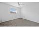 Bedroom with neutral color palette and large window providing natural light at 1758 Southview Rd, Largo, FL 33770