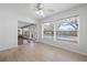 Bright living space with pool view, and light wood floors at 1758 Southview Rd, Largo, FL 33770