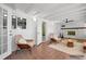 Cozy living space featuring a fireplace, neutral tones, and ample seating at 1758 Southview Rd, Largo, FL 33770