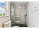 Clean bathroom with tiled walk-in shower at 17605 Simmons Rd, Lutz, FL 33548