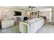 Spacious living room with a comfortable sofa, built-in shelving, and an open floor plan at 17605 Simmons Rd, Lutz, FL 33548