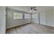Bright and airy bedroom with hardwood floors and ample natural light at 1835 Nevada Ne Ave, St Petersburg, FL 33703