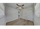 Serene bedroom featuring hardwood floors, natural light, and a ceiling fan at 1835 Nevada Ne Ave, St Petersburg, FL 33703