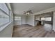 Open living space with hardwood flooring, recessed lighting, and a ceiling fan at 1835 Nevada Ne Ave, St Petersburg, FL 33703