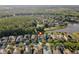 Enjoy the privacy of this neighborhood with mature trees, lush landscaping, and serene water views at 20146 Heritage Point Dr, Tampa, FL 33647