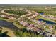This aerial view showcases the proximity to a pond and lush conservation area, perfect for nature enthusiasts at 20146 Heritage Point Dr, Tampa, FL 33647