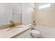 Bright bathroom featuring a vanity with granite countertop and a tub shower at 20146 Heritage Point Dr, Tampa, FL 33647