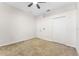Cozy bedroom with carpet, ceiling fan and closet at 20146 Heritage Point Dr, Tampa, FL 33647