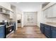 Bright kitchen featuring stainless steel appliances, ample cabinet space, and wood-look flooring at 20146 Heritage Point Dr, Tampa, FL 33647