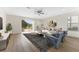 Bright living room with sliding glass door to backyard and stylish decor, perfect for relaxation and entertaining at 20146 Heritage Point Dr, Tampa, FL 33647