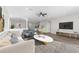 Spacious living room featuring stylish furniture and decor, with an open floor plan for modern living at 20146 Heritage Point Dr, Tampa, FL 33647