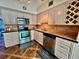 Functional kitchen with stainless steel appliances, ample cabinet space, and modern countertops at 2469 Franciscan Dr # 53, Clearwater, FL 33763