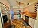 Well-equipped kitchen with stainless steel appliances and unique flooring at 2469 Franciscan Dr # 53, Clearwater, FL 33763