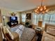 Inviting living room with large windows, comfortable seating, and stylish decor at 2469 Franciscan Dr # 53, Clearwater, FL 33763