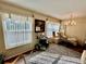 Bright and airy living room featuring natural light and elegant furnishings at 2469 Franciscan Dr # 53, Clearwater, FL 33763