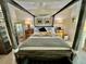 Beautiful main bedroom with unique bed frame, tasteful decor, and cozy ambiance at 2469 Franciscan Dr # 53, Clearwater, FL 33763