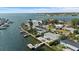 Waterfront property with boat dock, swimming pool, and lush tropical landscaping at 2540 S Shore Se Dr, St Petersburg, FL 33705