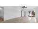 A well-lit bedroom with tile flooring, recessed lighting, and a ceiling fan at 2540 S Shore Se Dr, St Petersburg, FL 33705