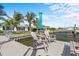Dockside seating offers tranquil water views and sunny skies at 2540 S Shore Se Dr, St Petersburg, FL 33705