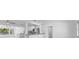 Bright, open-concept living area featuring a modern kitchen with stainless steel appliances at 2540 S Shore Se Dr, St Petersburg, FL 33705