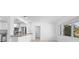 Bright, open living space showcasing kitchen and dining area with stainless steel appliances at 2540 S Shore Se Dr, St Petersburg, FL 33705
