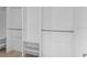 A walk-in closet featuring built-in shelving and hanging rods at 2540 S Shore Se Dr, St Petersburg, FL 33705