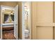 Hall bathroom with a toilet is located off of the bedroom at 2613 Bonterra Blvd, Valrico, FL 33594