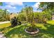 Beautiful front yard with tropical landscaping at 2613 Bonterra Blvd, Valrico, FL 33594