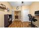 Open and inviting home office with French doors, wood floors and good light at 2613 Bonterra Blvd, Valrico, FL 33594