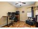 Home office space with wood floors, ceiling fan and good natural light at 2613 Bonterra Blvd, Valrico, FL 33594