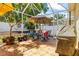 Enclosed patio with a dining table, chairs and grill at 2613 Bonterra Blvd, Valrico, FL 33594