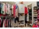 Organized walk-in closet with ample storage for clothing, accessories, and shoes at 3009 Sheehan Dr, Land O Lakes, FL 34638