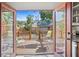 The backyard features a wooden deck and a fenced-in yard with lots of greenery and seating at 3120 8Th N Ave, St Petersburg, FL 33713