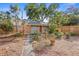 Landscaped backyard with a shed and stepping stone pathway, perfect for outdoor relaxation and gardening at 3120 8Th N Ave, St Petersburg, FL 33713