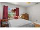 The bedroom features hardwood floors, lots of natural light, white walls, and a ceiling fan at 3120 8Th N Ave, St Petersburg, FL 33713