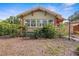 Charming home with light green exterior and many windows at 3120 8Th N Ave, St Petersburg, FL 33713