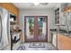 Modern kitchen showcasing stainless steel appliances, granite countertops, and access to the deck at 3120 8Th N Ave, St Petersburg, FL 33713